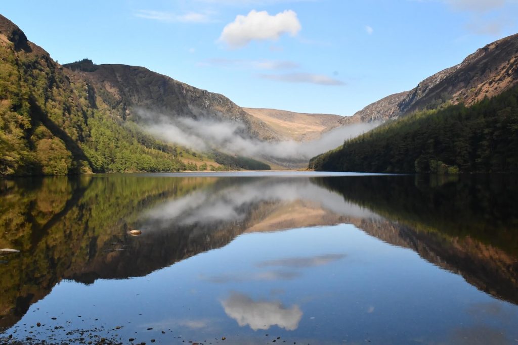 A reflected view of the Upper Lake in Glendalough | Footfalls Walking Holidays in Wicklow Ireland